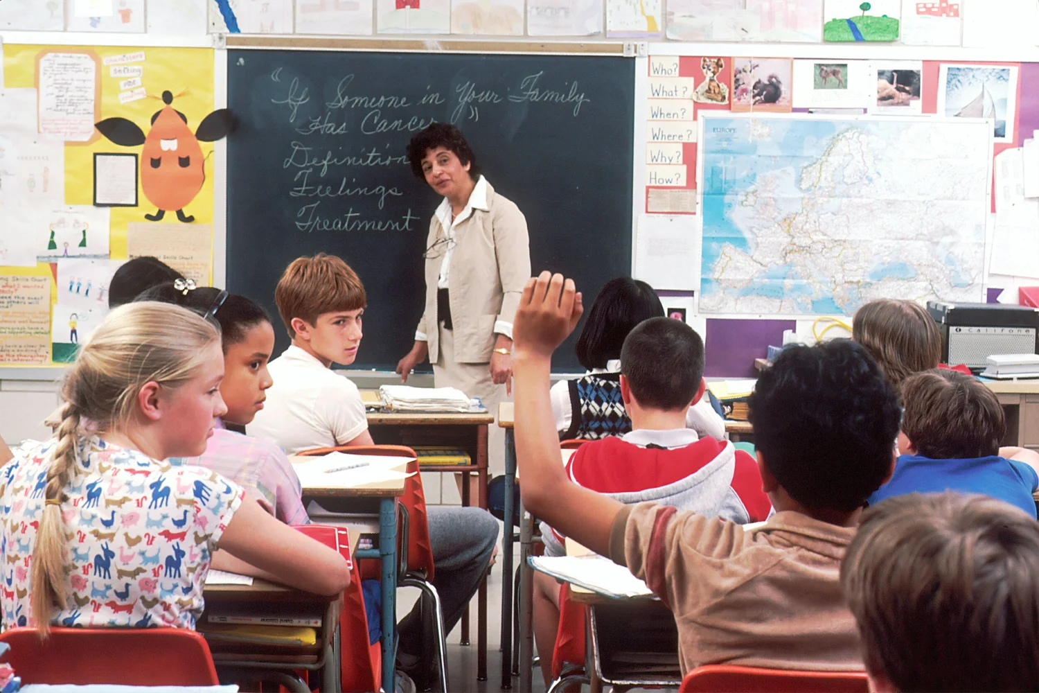 A teacher leading a lively classroom