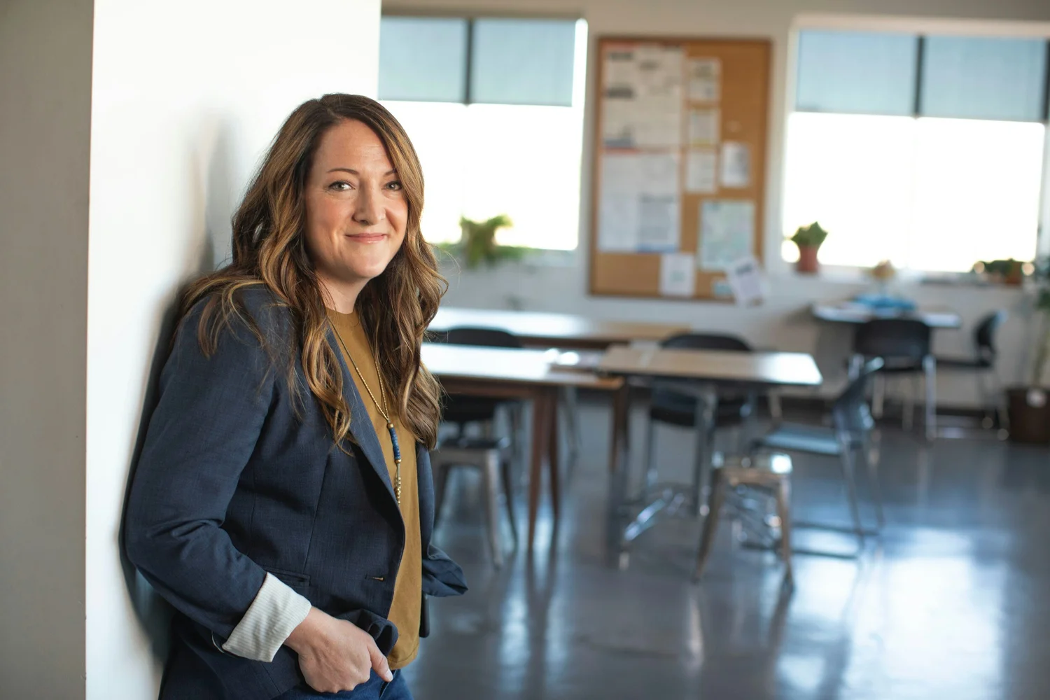 An educator in a bright classroom